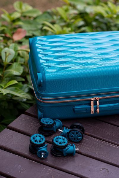 Валіза Sweetkeys SK190 з полікарбонату ручна кладь мала (S) з розширенням бірюзова SK190 S blue фото