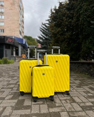 велика (L) валіза на 4 колесах Wings 190 Польща жовта 190 фото