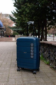Валіза WINGS HWF03 Поліпропілен на 4-х колесах, велика L синя HWF03 L blue фото